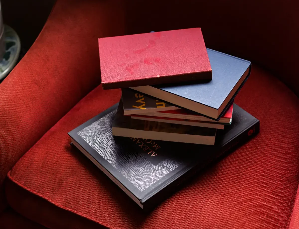 Books on a chair from Borrow Me Book, an online bookstore in Lebanon